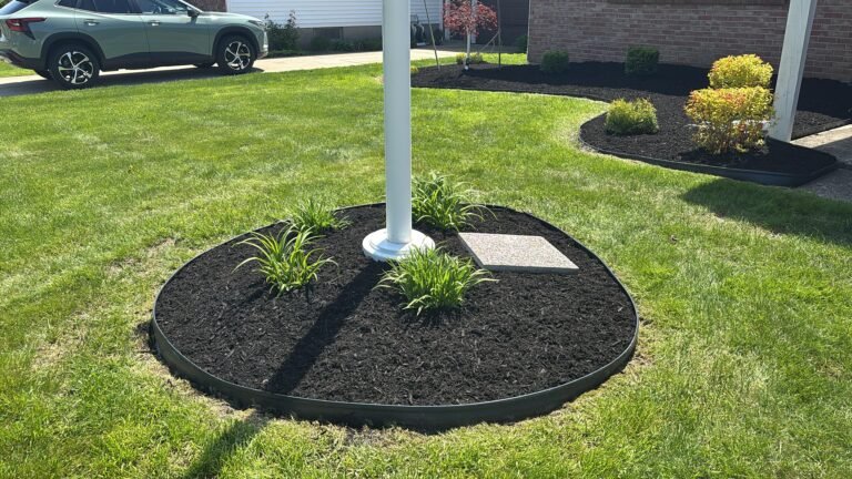 Natural edging and mulch by 716 Lawn Care in Buffalo, NY