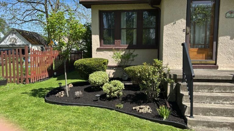 Bush trimming and mulch bed by 716 Lawn Care in Buffalo, NY